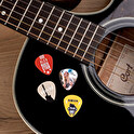 Plektrum gitarr med tryck