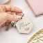 Personalised wooden keyring with the shape of a hexagon Personalised wooden keyring with the shape of a hexagon
