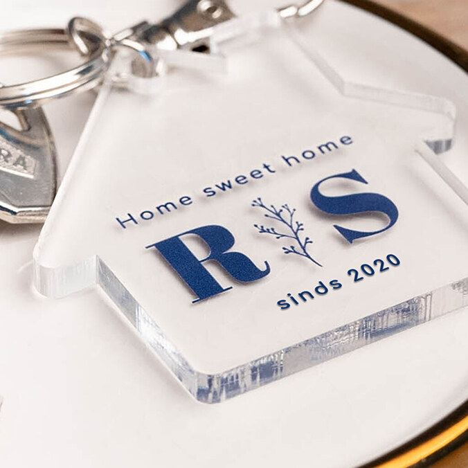 Methacrylaat sleutelhanger in de vorm van een huis bedrukken