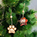 Personalised wooden paw shaped Christmas ornament