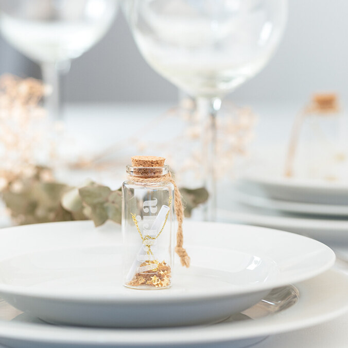 Engraved glass bottle