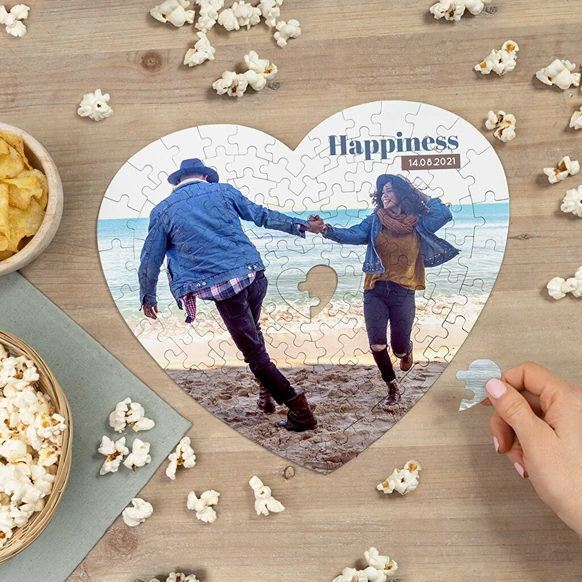 Heart shaped jigsaw puzzle with image and text 