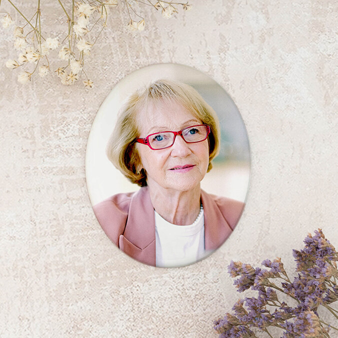 Porseleinen foto op grafsteen