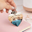 Personalised wooden keyring with the shape of a heart Personalised wooden keyring with the shape of a heart