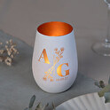 Engraved glass candle holder