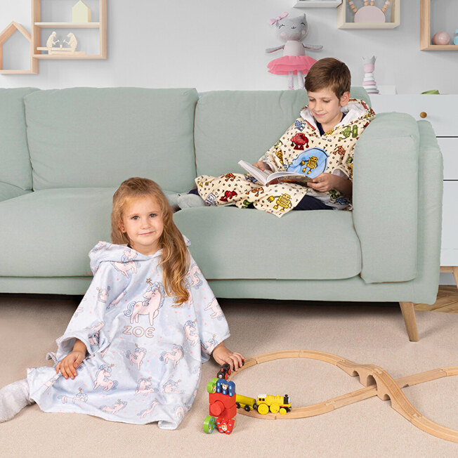 Poncho-huopa omalla kuvalla Poncho-huopa omalla kuvalla