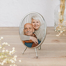 Oval porcelain memorial picture with steel stand