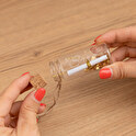 Engraved glass bottle