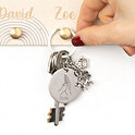 Llavero grabado con charms de perros