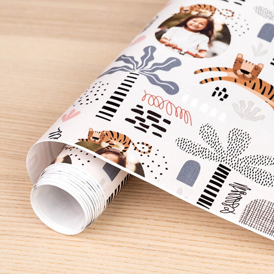 Personalised wrapping paper is a perfect packaging for merchandising or personal gifts.