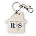 Personalised wooden keyring with the shape of a house