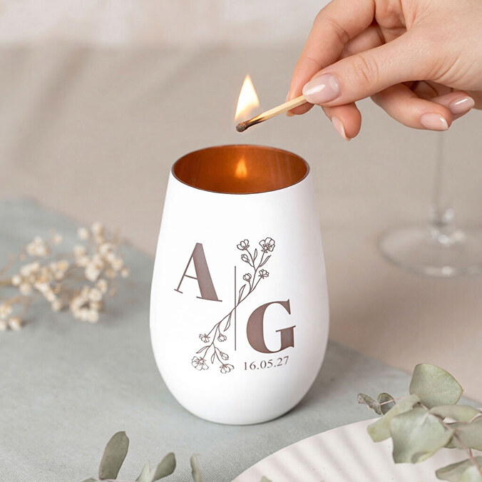 Engraved glass candle holder