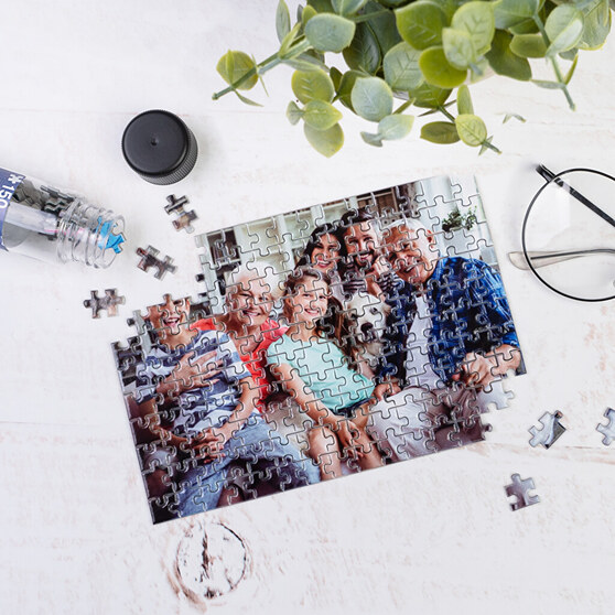 Worlds smallest jigsaw puzzle with photo