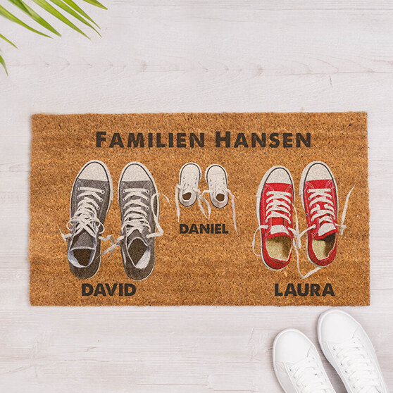 Personlig dørmåtte med skomotiv og familiens navne Personlig dørmåtte med skomotiv og familiens navne