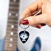 Sleutelhanger met bedrukt gitaar plectrum Sleutelhanger met bedrukt gitaar plectrum