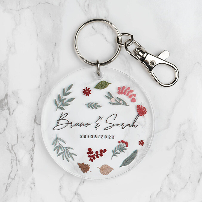Personalised acrylic keyring with a round shape