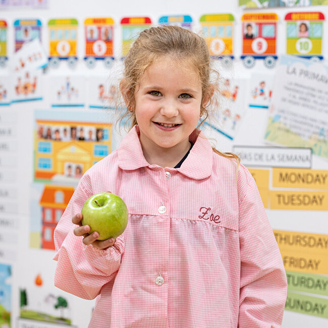 Schoolschort met knopen bedrukken