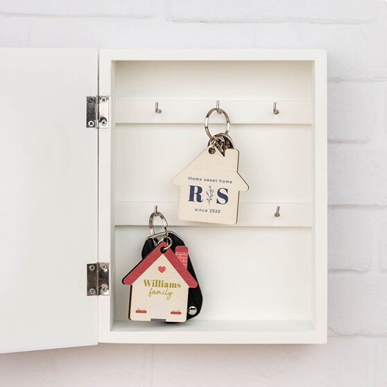 Personalised house shaped wooden keyrings Personalised house shaped wooden keyrings