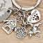 Portachiavi inciso con charm a forma di cane Portachiavi inciso con charm a forma di cane