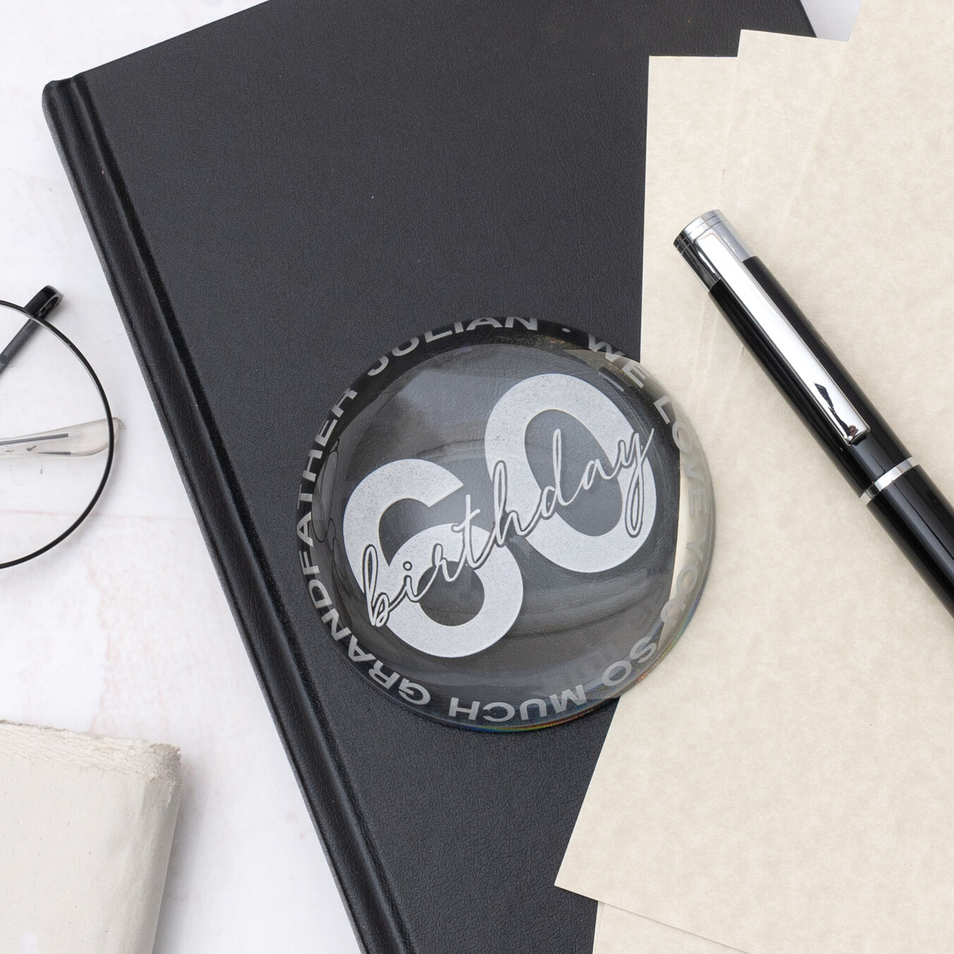 Personalised glass paperweight magnifying glass