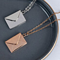 Necklace with envelope pendant and engraved letter
