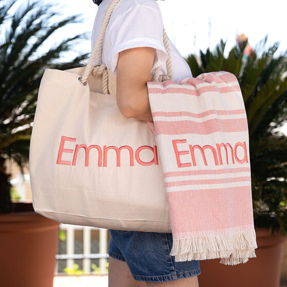 Embroidered beach bag and towel