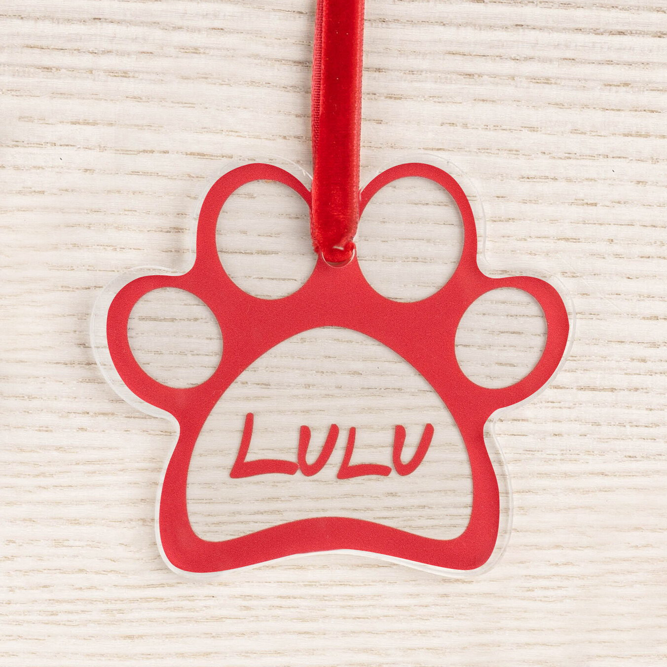 Personalised paw shaped acrylic Christmas ornament
