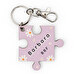Personalised wooden keyring with the shape of a puzzle piece Personalised wooden keyring with the shape of a puzzle piece