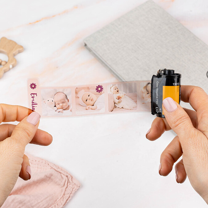 Valokuva-albumi filmirulla avaimenperä