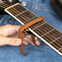 Cejilla de guitarra personalizada