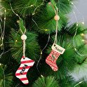 Adorno de Navidad personalizado de madera con forma de bota