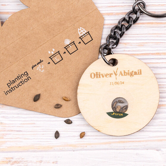 Engraved wooden keyring with seeds